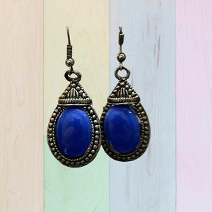 Earrings with a blue stone